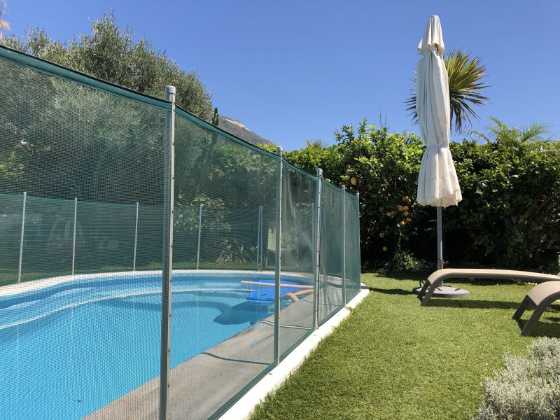 Mesh Pool Fence in Residential Setting